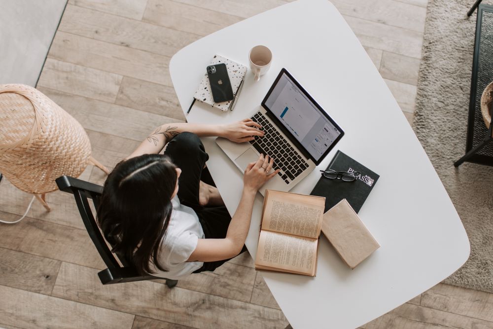 A remote employee working on a laptop.